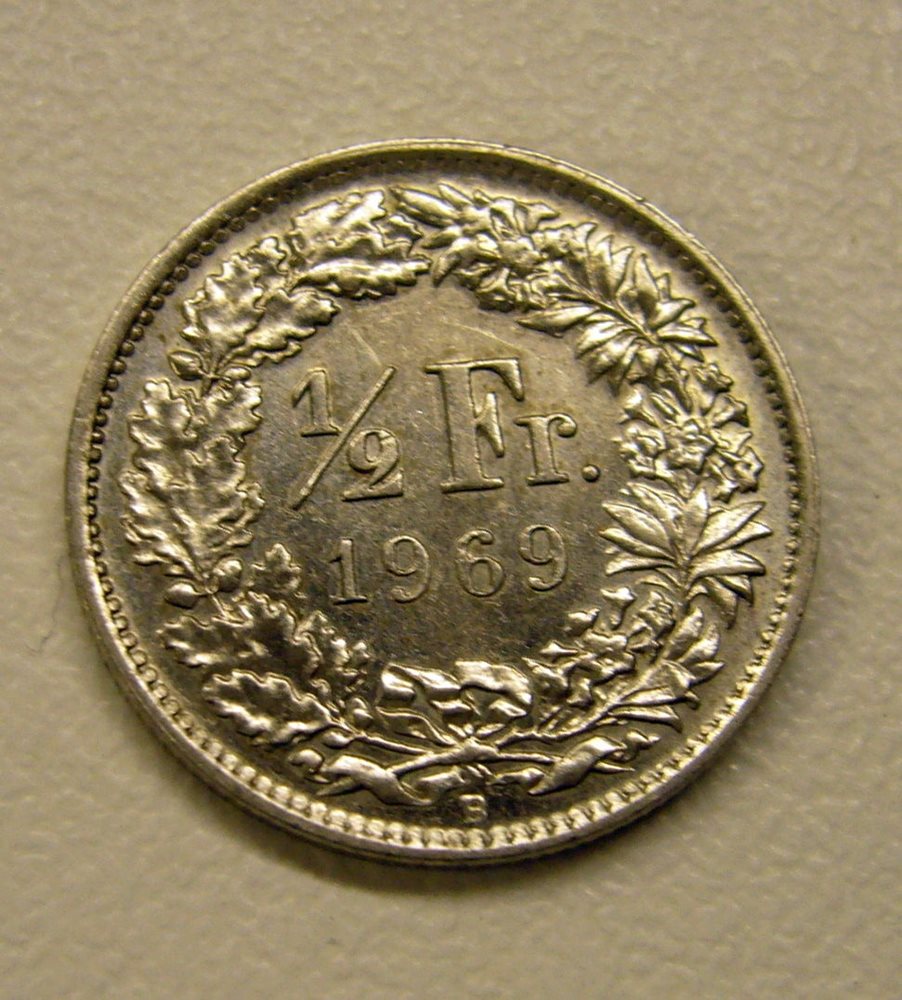 монета полфранка